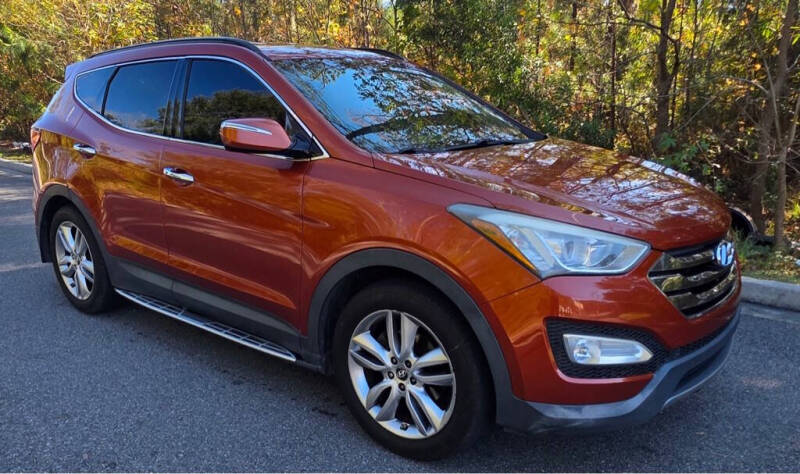 hyundai santa fe 2014 5XYZU3LA5EG196942 image hyundai santa fe 2014 5XYZU3LA5EG196942 image